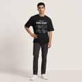 Model wearing Binge Ready oversized t-shirt, front view showing chest print