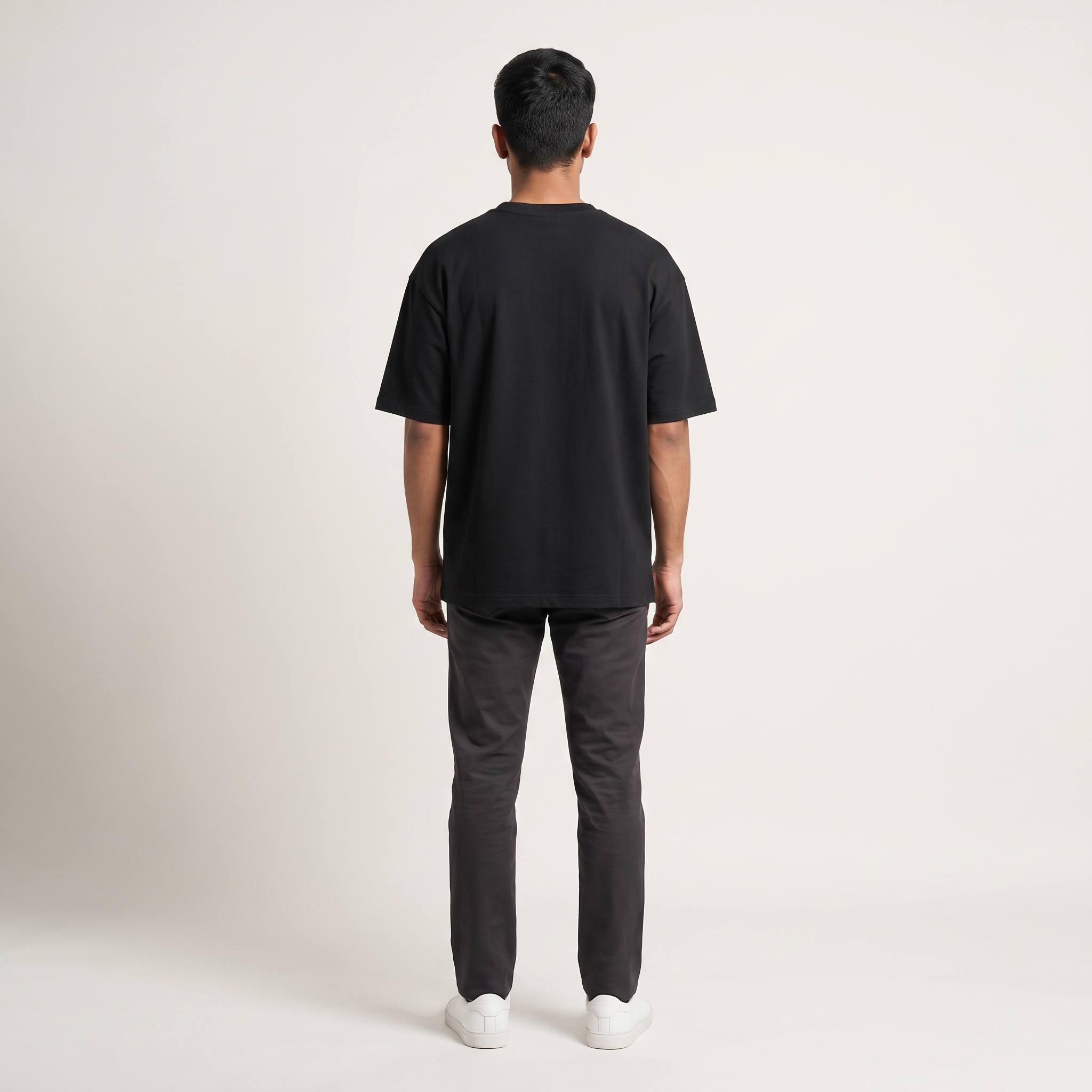 Model wearing Binge Ready oversized t-shirt, back view