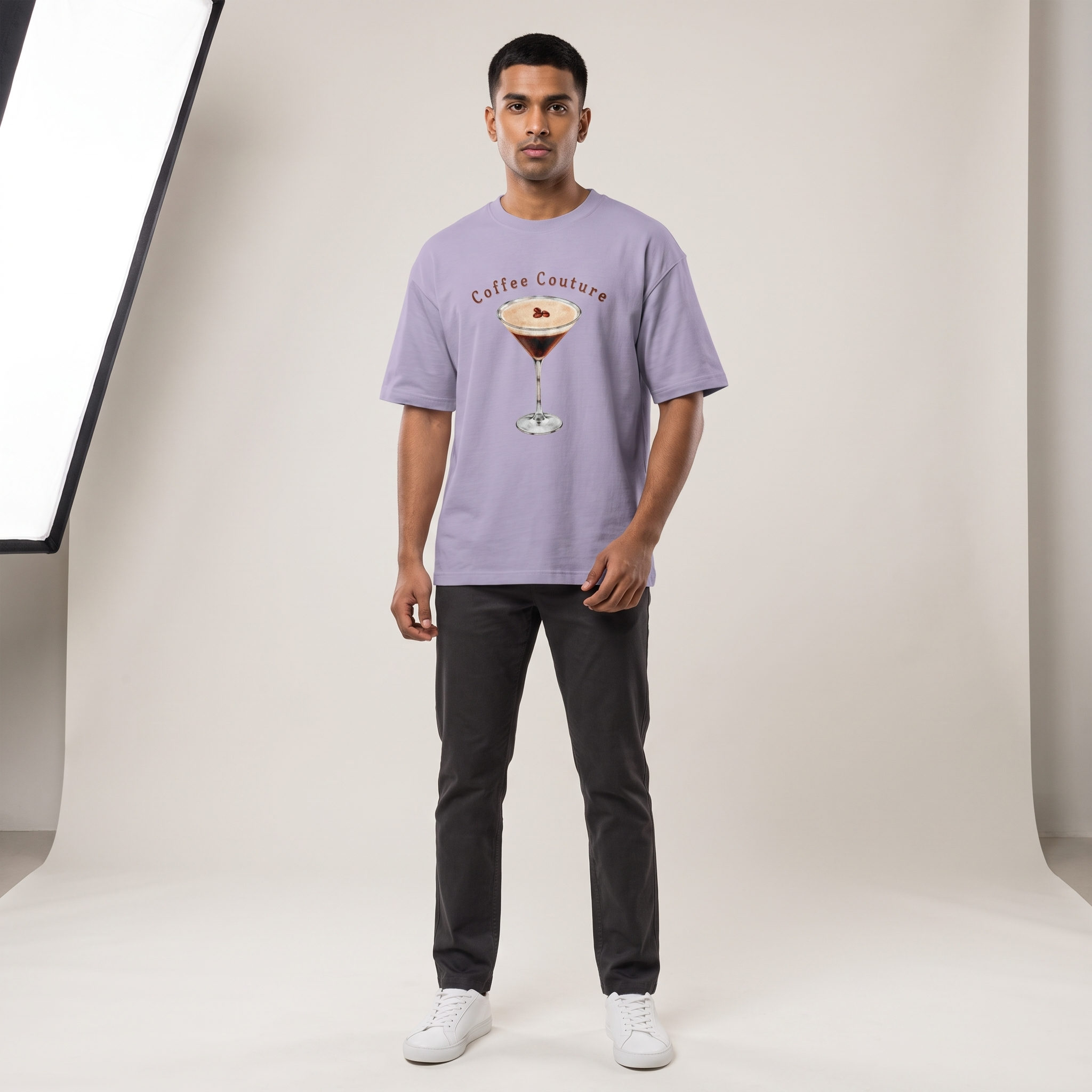 Model wearing Coffee Couture oversized t-shirt, front view showing chest print