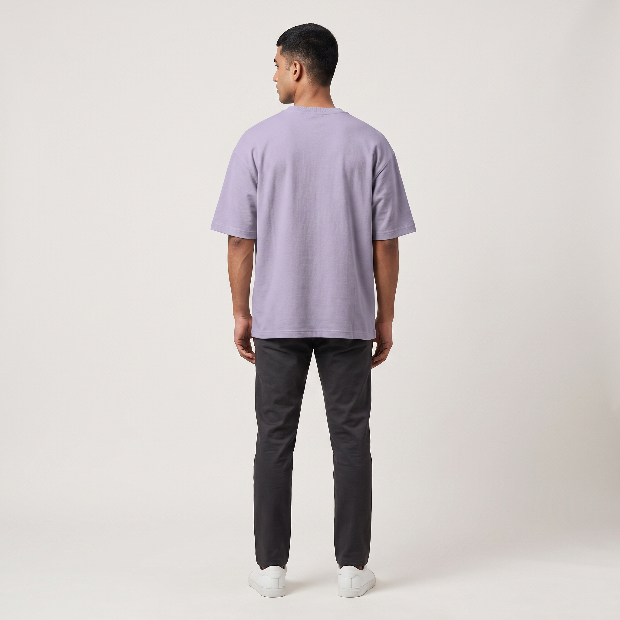 Model wearing Coffee Couture oversized t-shirt, back view