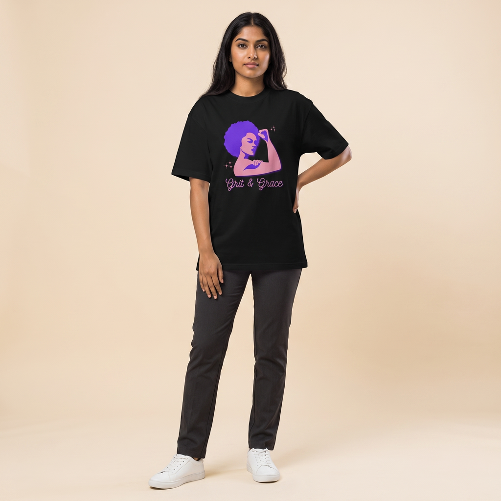 Female model wearing Grit and Grace oversized t-shirt, front view showing chest print