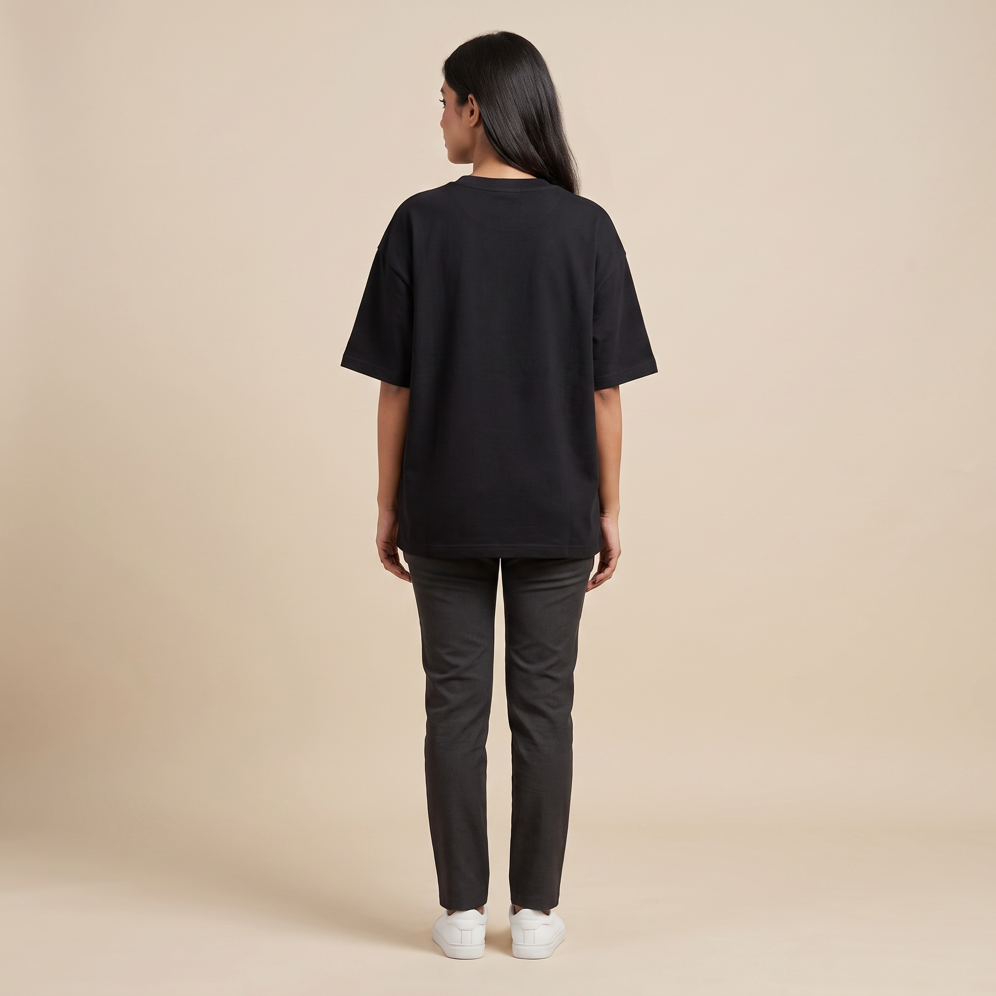 Female model wearing Self Love Era oversized t-shirt, back view