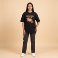 Female model wearing Pota-Ting oversized t-shirt, front view showing chest print
