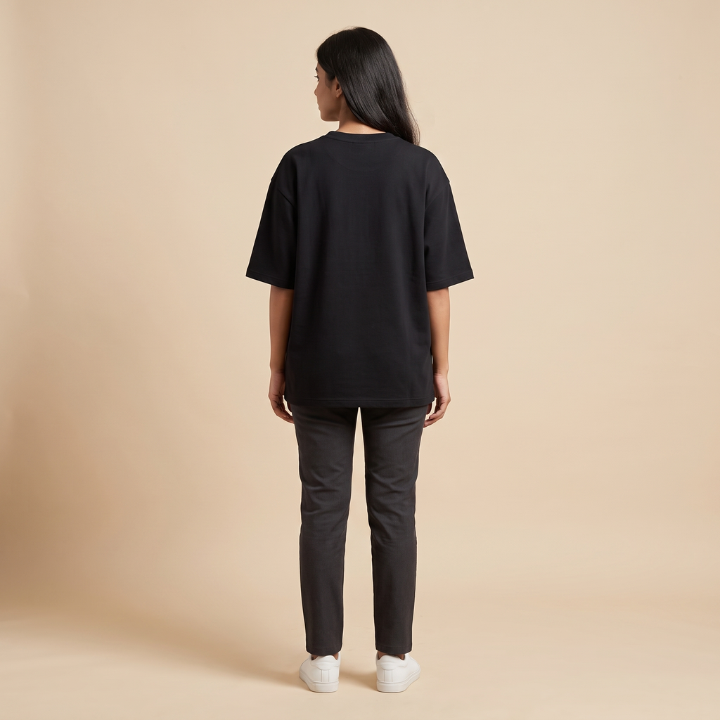 Female model wearing Damaged oversized t-shirt, back view