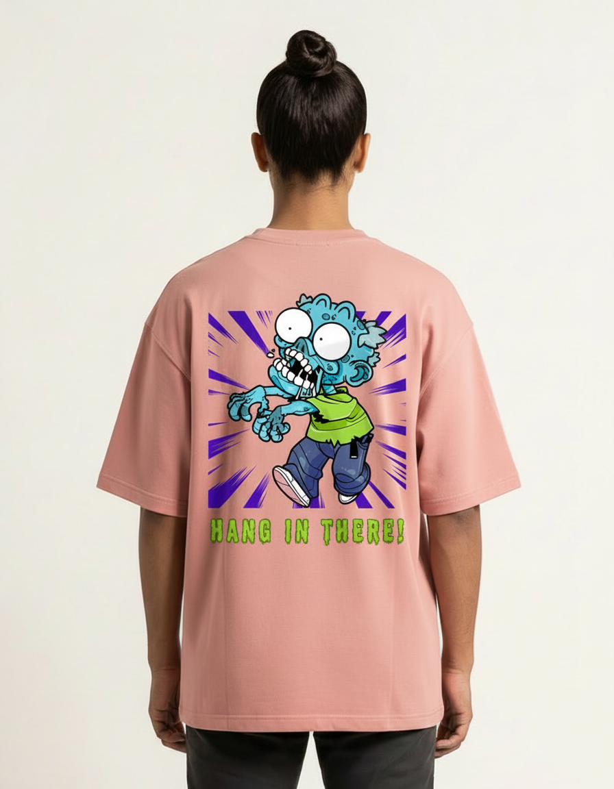 Hang In There - Flamingo - Chapter26 premium oversized graphic t-shirt, back print, worn by a female model