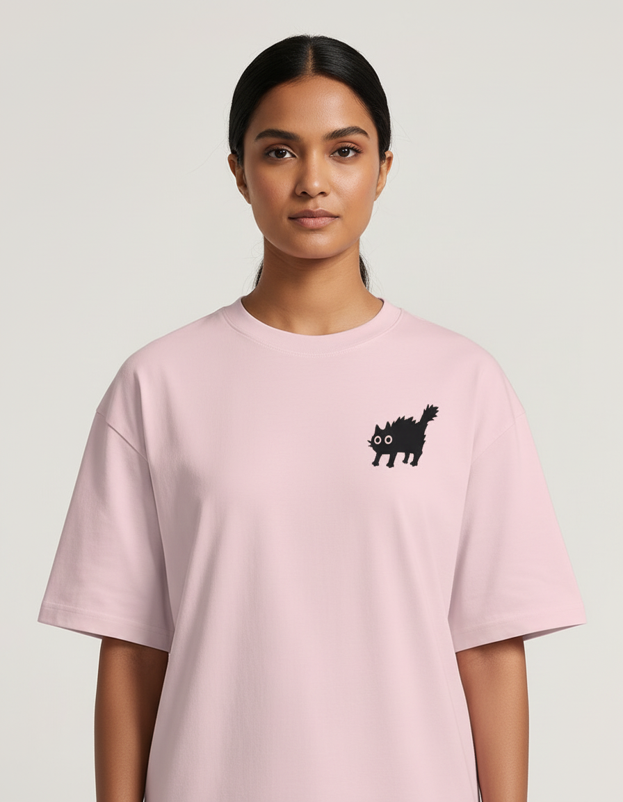 Freaky Cat Oversized T-Shirt - Light Baby Pink - Chapter26 premium oversized graphic t-shirt, worn by a female model