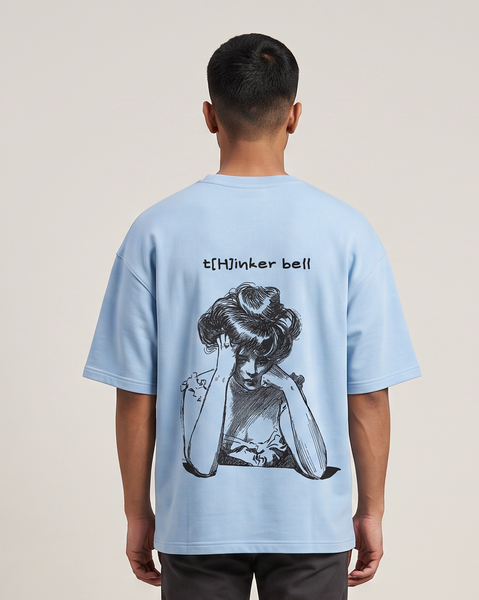 Thinker Bell oversized t-shirt back print on model - Baby Blue