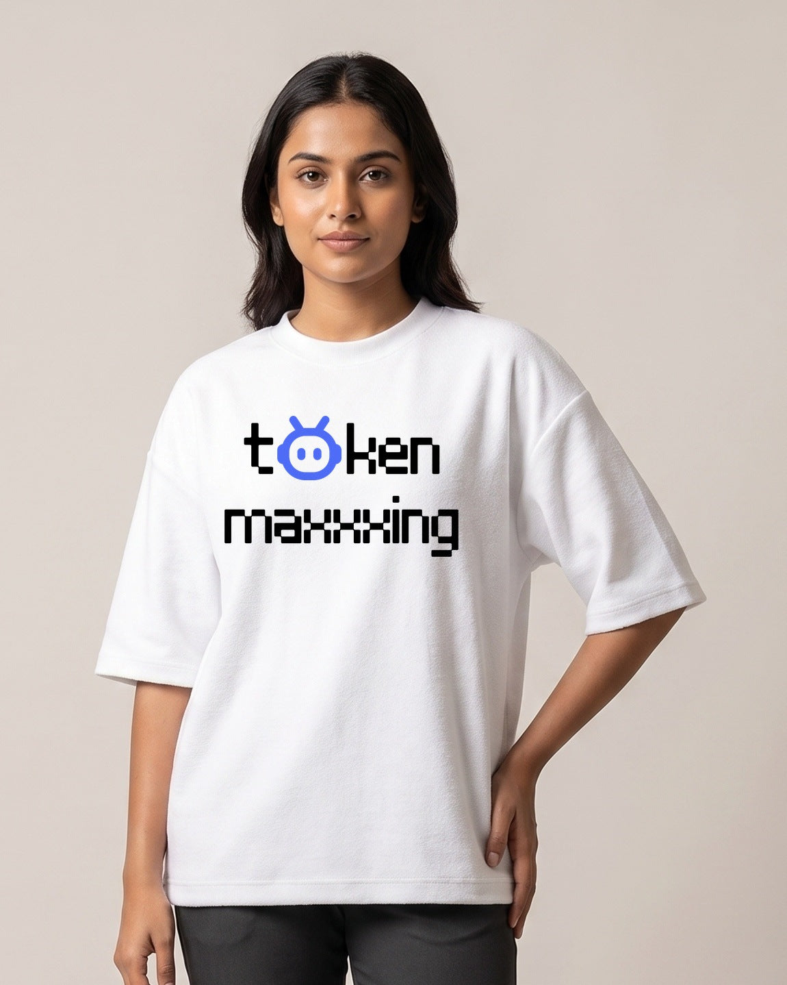 Token Maxxing - Light - White - Chapter26 premium oversized graphic t-shirt, worn by a female model